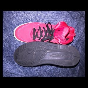 Pair of red and white Jordan flights